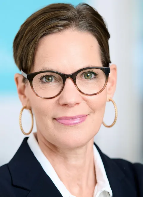 Corinna Kuss, lawyer